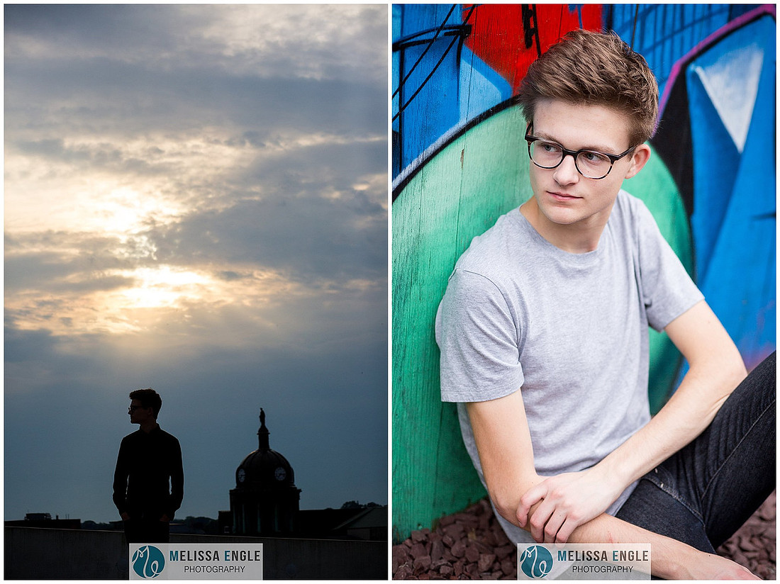 Creative senior portrait of a guy wearing glasses in an urban setting in downtown Lancaster City.