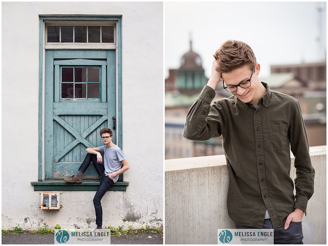 Creative senior portrait of a guy wearing glasses in an urban setting in downtown Lancaster City.