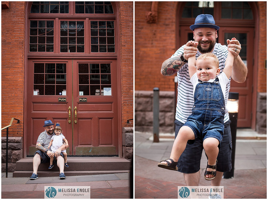 Candid family photo of parents with twins in downtown Lancaster City, PA.