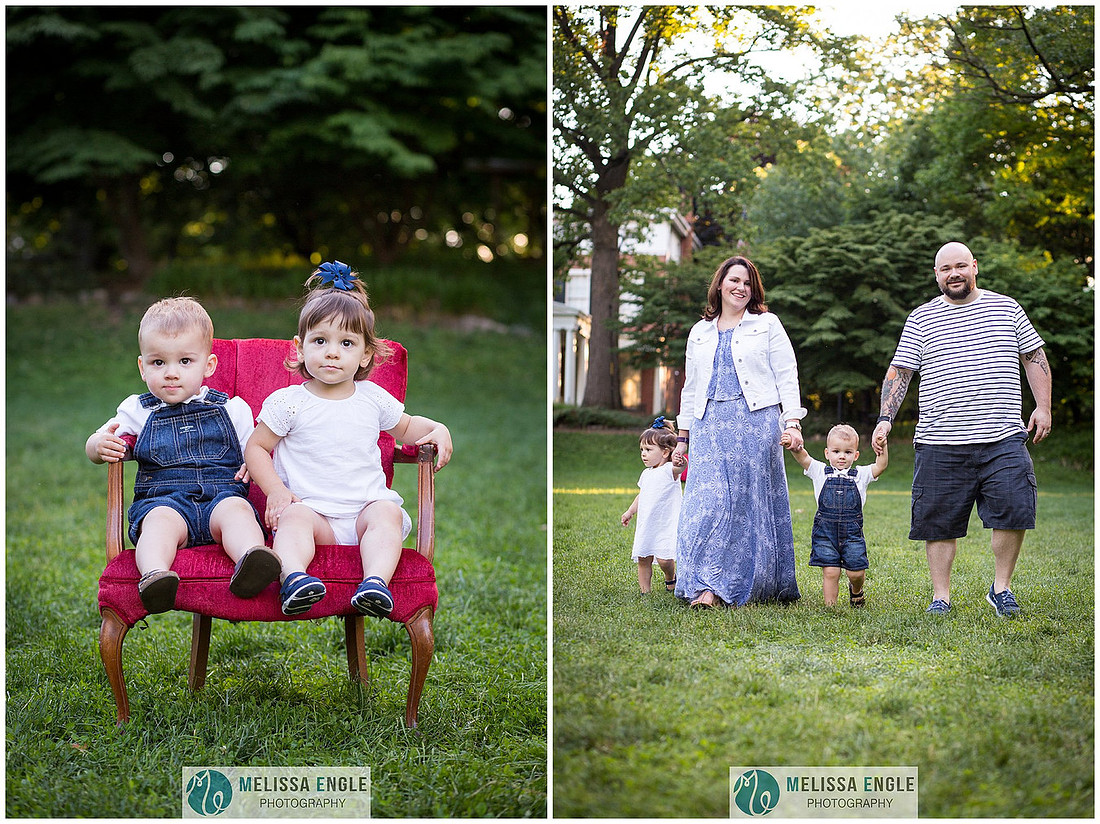 Photo of two-year-old twins sitting on a red chair in Musser Park.
